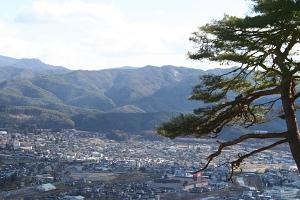 山頂から見た辰野町の写真